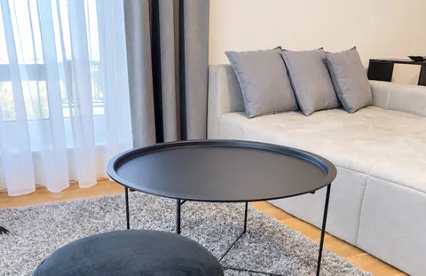 Sitzecke mit Couchtisch · CityFlat Wels